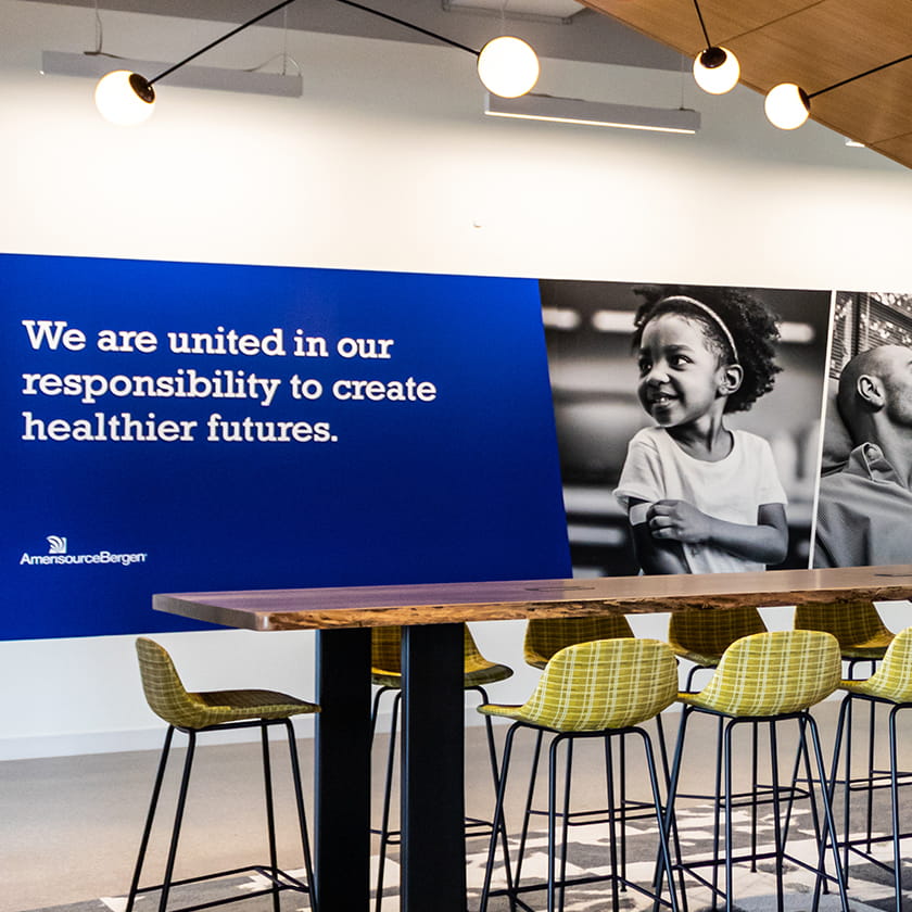 AmerisourceBergen mural behind a collaborative workspace