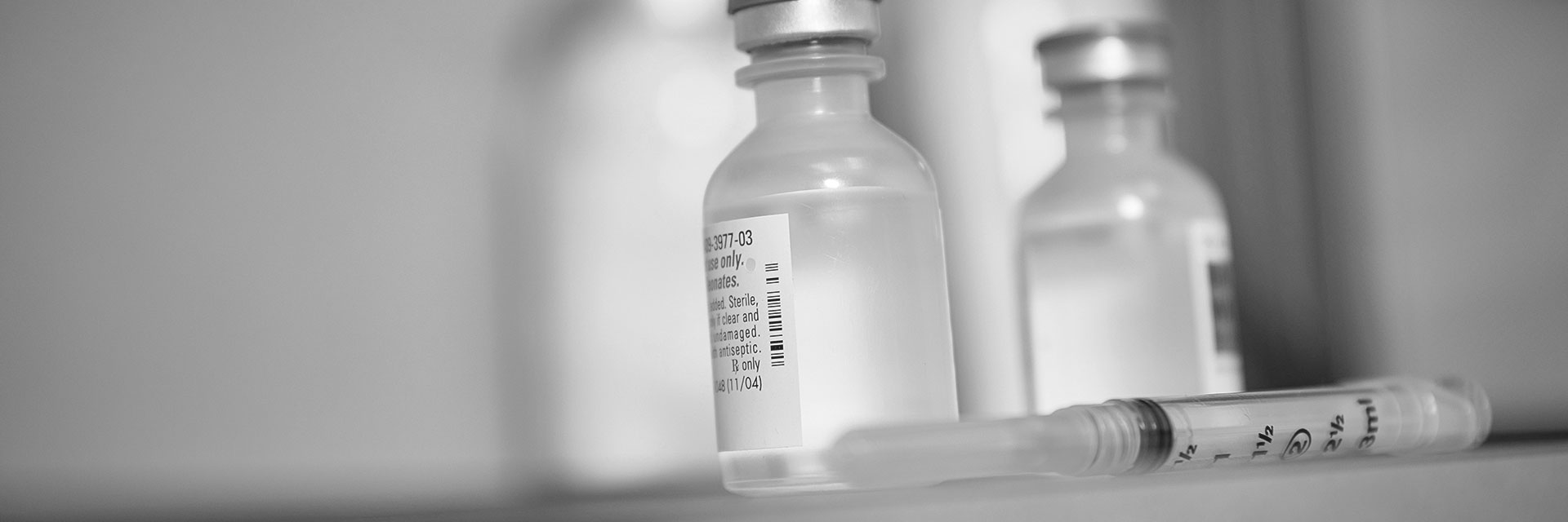 Two vials and a syringe